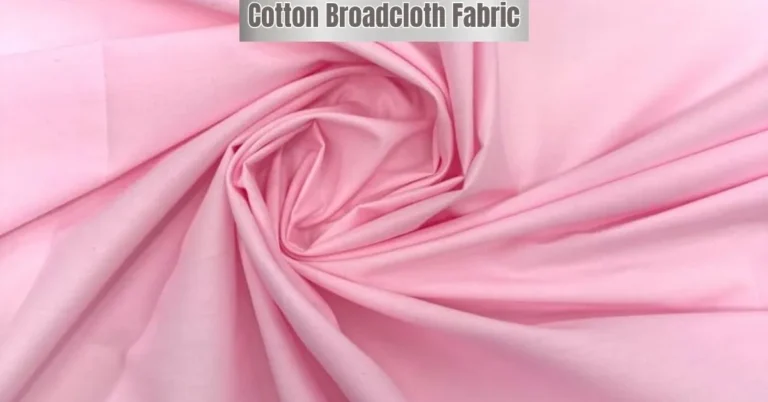 Pink cotton broadcloth fabric with smooth texture and soft folds