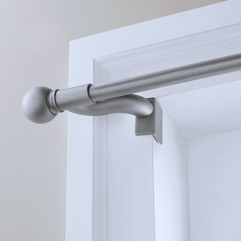 Adjustable tension rods used in a small space, requiring no drilling for easy installation.