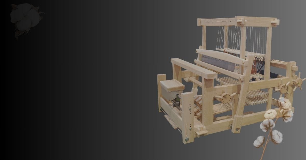 A wooden loom with cotton, representing textile stories and craftsmanship