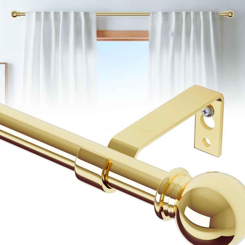 Elegant brass curtain rods with a gold finish, enhancing the luxurious feel of the window treatment.