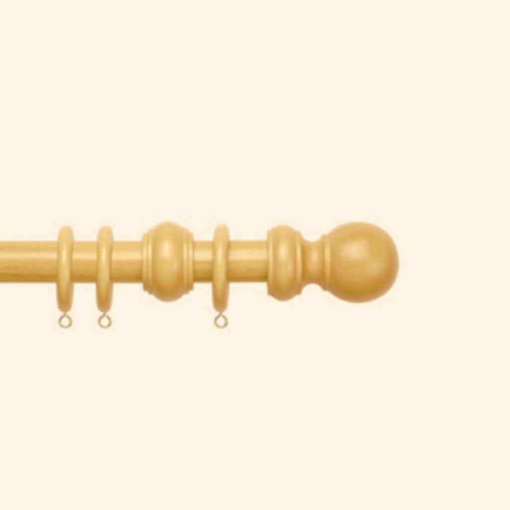 Classic wooden curtain rods with a polished oak finish, complementing traditional decor.