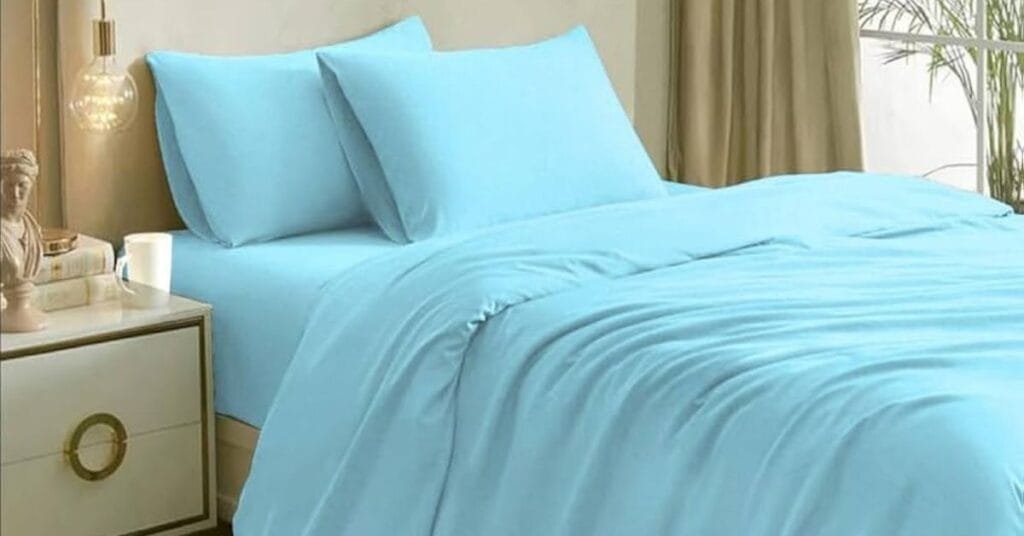 Refreshing aqua blue bedsheets bringing coolness.