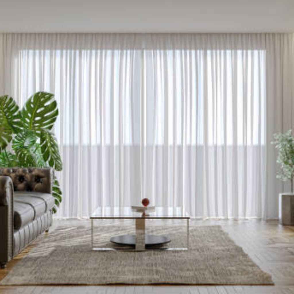 Luxurious floor-to-ceiling curtains in soft fabric.